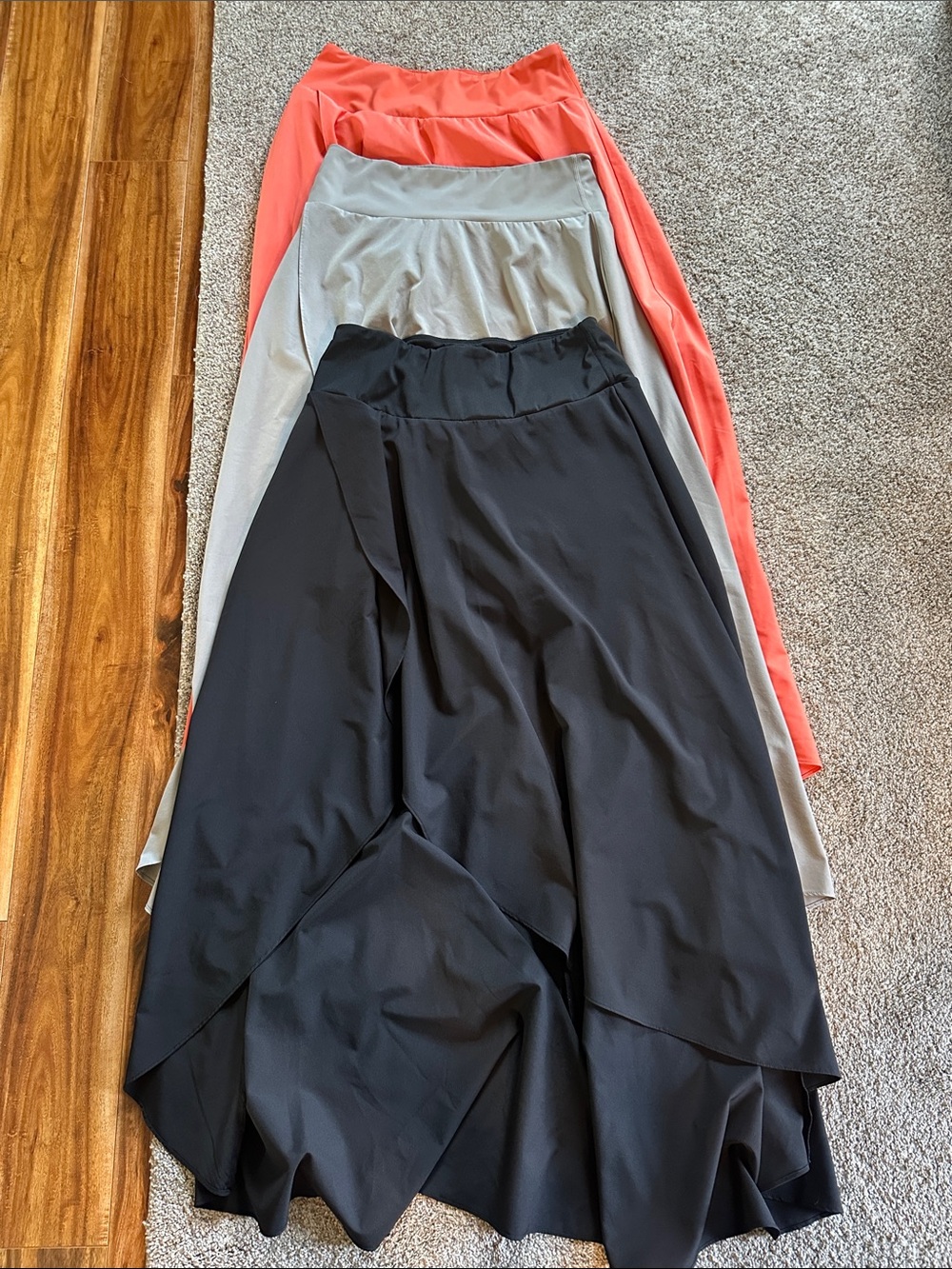 HALARA High-Low Layered Skirt Trio - Coral, Light Gray, Black